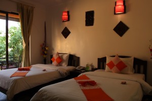 Нашата стая :) Цветовете от лотус по леглата са истински :)